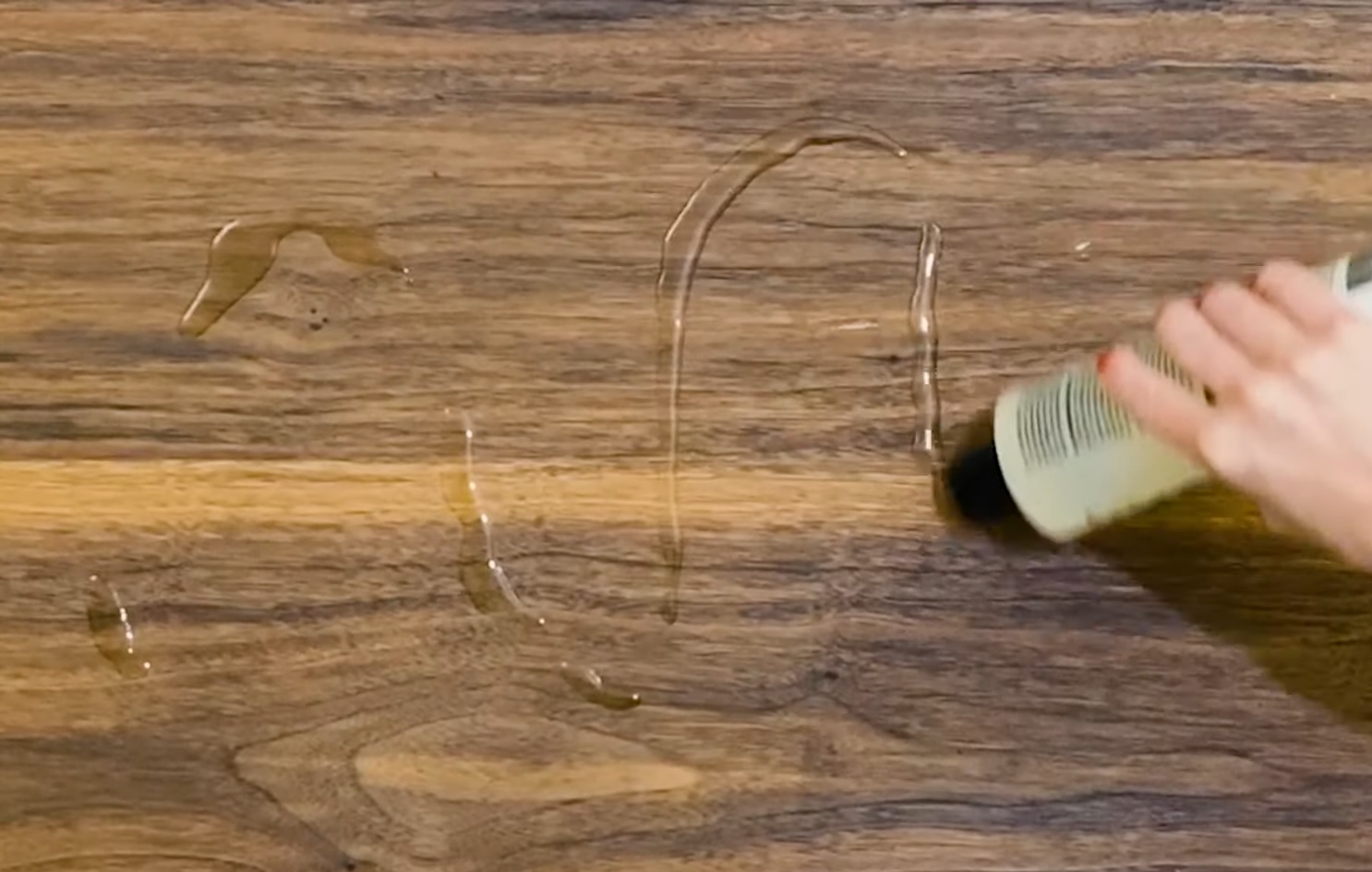 How do you clean the surface of a wood table